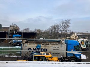 Trucks unloading asbestos Trucks unloading asbestos